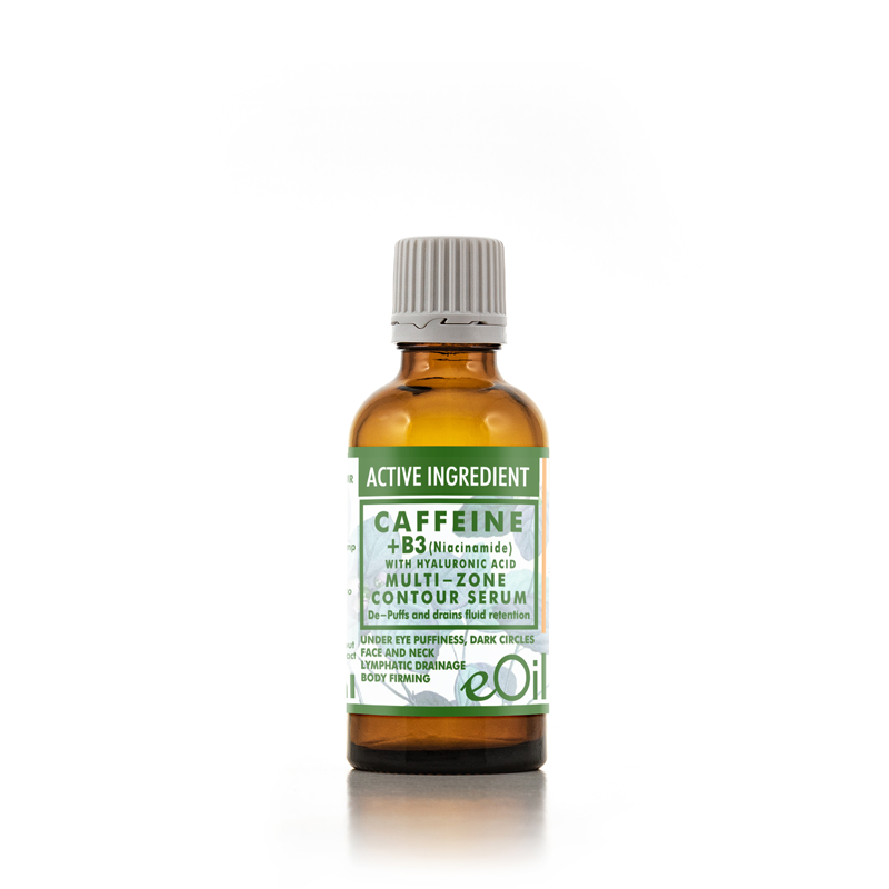 An amber glass bottle of eoil Caffeine + B3 Multi-Zone Contour Serum with a ribbed gray cap, set against a clean white background with a subtle reflection.