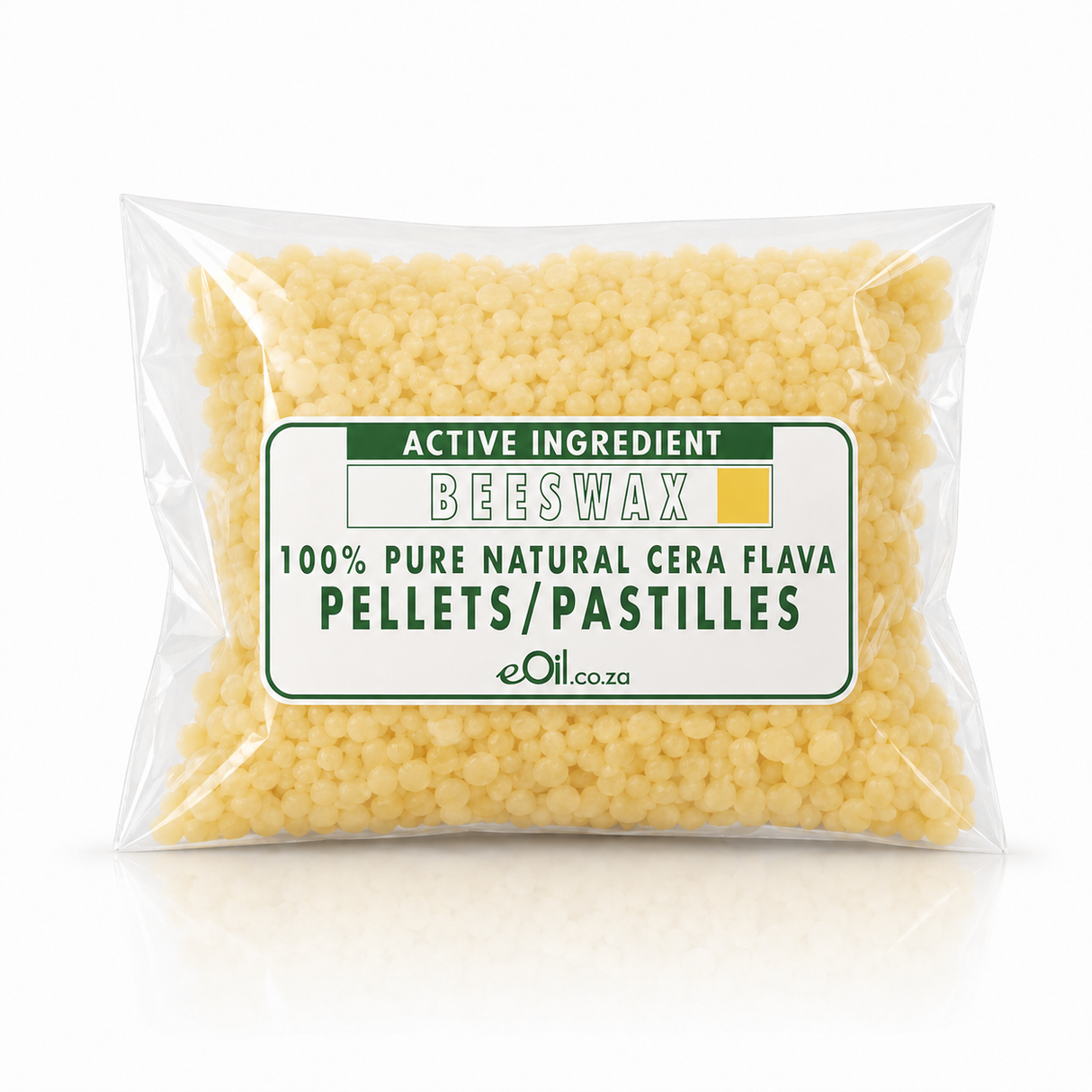 A clear plastic bag filled with pale yellow beeswax pellets, featuring a white label with green and black text that reads 'ACTIVE INGREDIENT BEESWAX 100% PURE NATURAL CERA FLAVA PELLETS/PASTILLES' and the brand 'eOil.co.