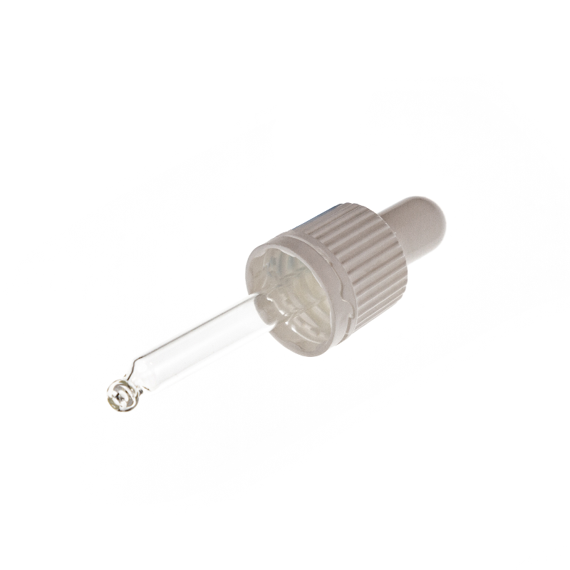 A single clear glass dropper pipette with a ribbed translucent gray cap, isolated on a solid white background.
