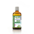 A bottle of Saffron Kesar Macerated Carrier Oil with a label that includes product information and branding.