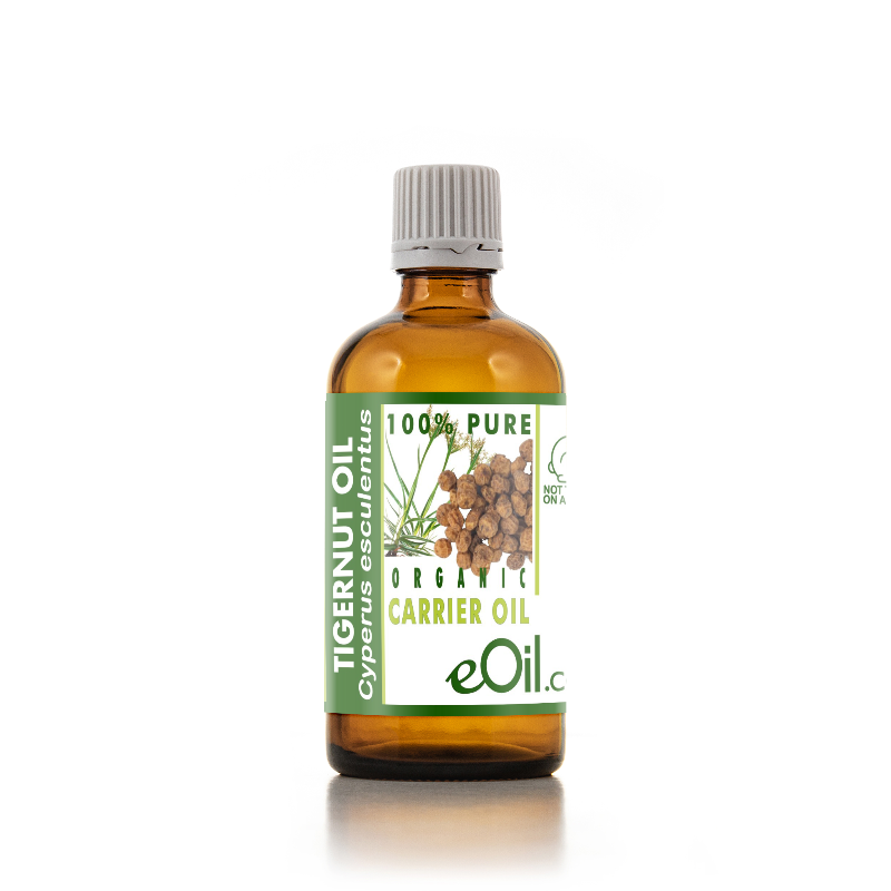 A bottle of eOil.tigernut oil carrier oil, featuring an amber glass bottle with a green and white label and a gray ribbed cap, set against a plain white background.