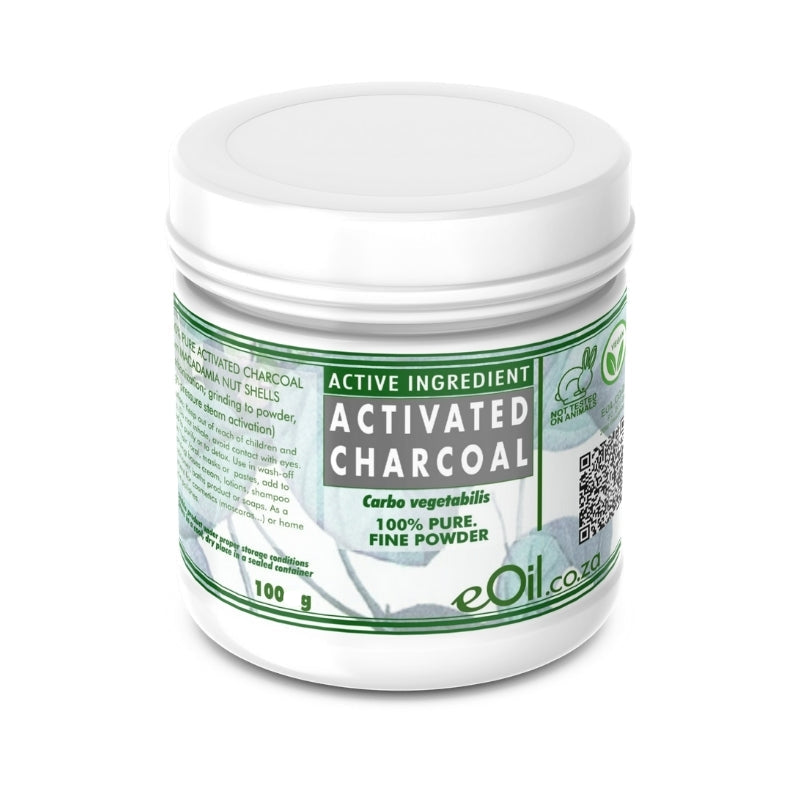 Jar of activated charcoal with a white lid on a white background