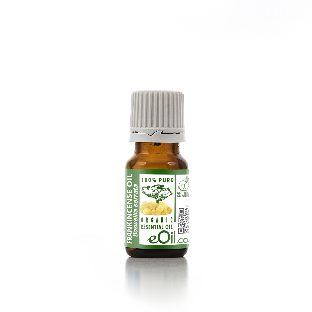 Essential oil bottle with a green label on a white background
