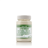 A jar of BASE Avocream Natural Cream with avocado and jojoba oil, featuring a white cap and a white and green label, set against a plain white background.