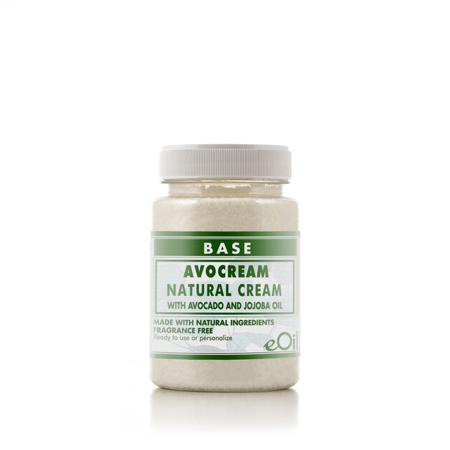 A jar of BASE Avocream Natural Cream with avocado and jojoba oil, featuring a white cap and a white and green label, set against a plain white background.