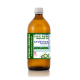 Bottle of Ayurveda massage oil with a colorful label on a white background
