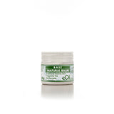 A small open jar of Base Natural Balm, with a label that indicates it is a beeswax based balm for multiple uses, in a 50g size, and fragrance-free.