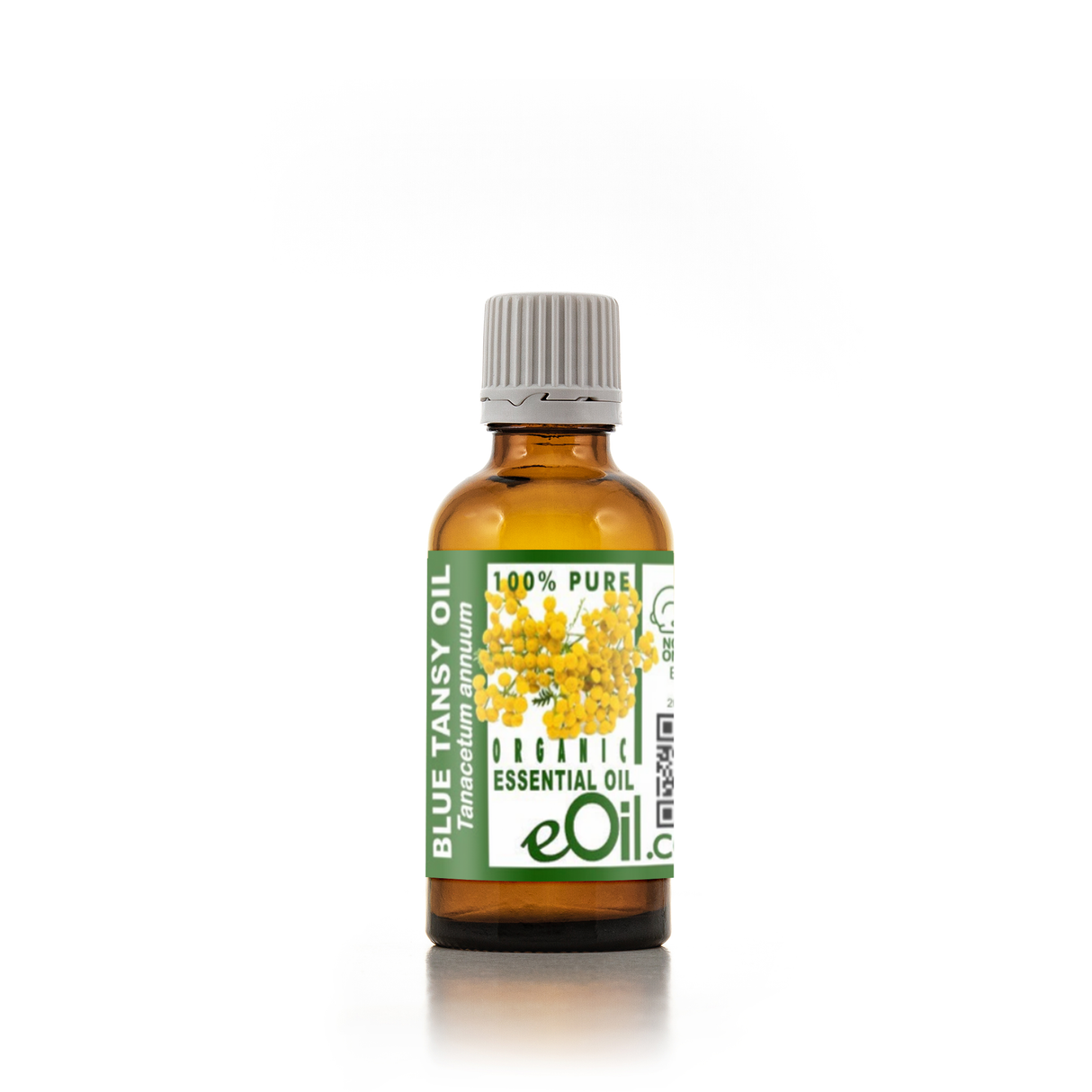 Bottle of Blue Tansy essential oil with a green label on a white background