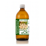Bottle of frankincense essential oil with a green label on a white background