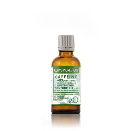 An amber glass bottle of eoil Caffeine + B3 Multi-Zone Contour Serum with a ribbed gray cap, set against a clean white background with a subtle reflection.