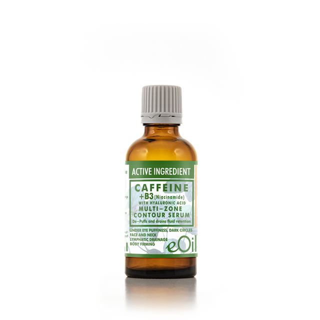 An amber glass bottle of eoil Caffeine + B3 Multi-Zone Contour Serum with a ribbed gray cap, set against a clean white background with a subtle reflection.