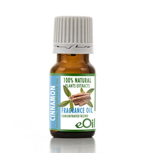 A small amber glass bottle of eOil Cinnamon Natural Fragrance Oil with a white ribbed cap, featuring a green and blue label with cinnamon illustrations, on a white background.
