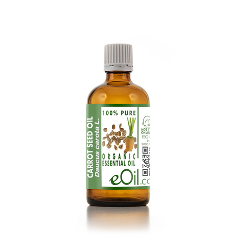 Bottle of carrot seed oil with a green label on a white background