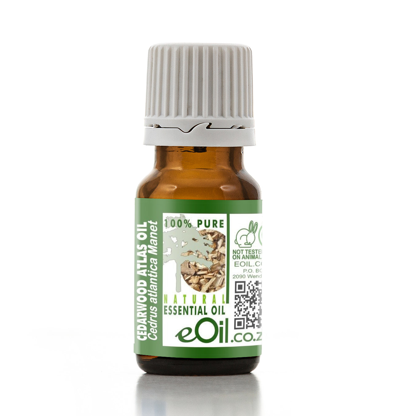Bottle of Cedarwood Atlas essential oil with a green label on a white background