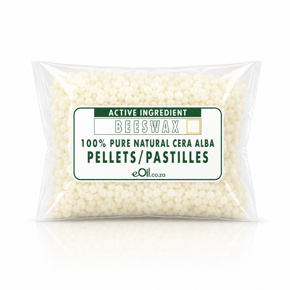 A clear plastic bag filled with off-white beeswax pellets, featuring a white label with green and gold text that reads 'ACTIVE INGREDIENT BEESWAX 100% PURE NATURAL CERA ALBA PELLETS/PASTILLES eOil.co.
