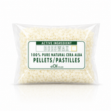 A clear plastic bag filled with off-white beeswax pellets, featuring a white label with green and gold text that reads 'ACTIVE INGREDIENT BEESWAX 100% PURE NATURAL CERA ALBA PELLETS/PASTILLES eOil.co.