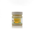 A jar of eOil cocoa butter, labeled as 100% Pure Raw Unrefined, with a capacity of 100 grams.