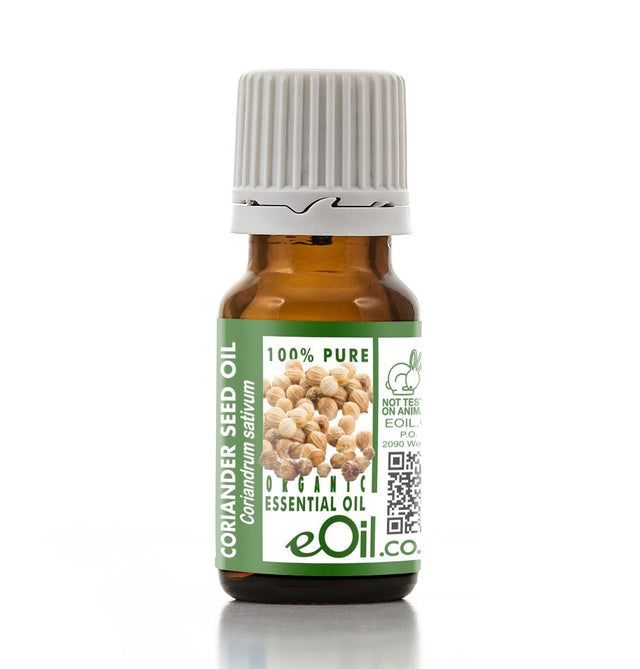 Bottle of coriander seed essential oil with a green label on a white background