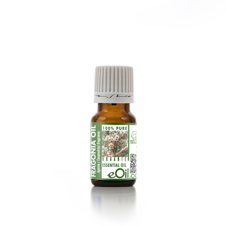 Essential oil bottle with a green label on a white background