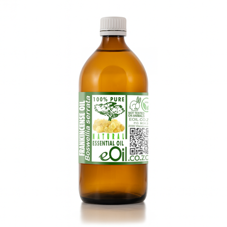 Bottle of essential oil with a green label on a white background 500 ml