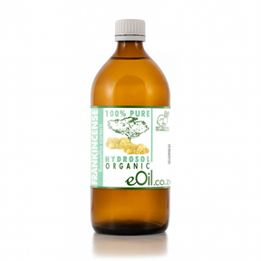 Bottle of organic hydrosol with a label on a white background