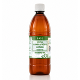 A 500 ml amber-colored plastic bottle of eOil Base Neutral Hand & Body Lotion with a white cap and a green and white label.