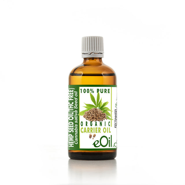 Bottle of organic carrier oil with a white background