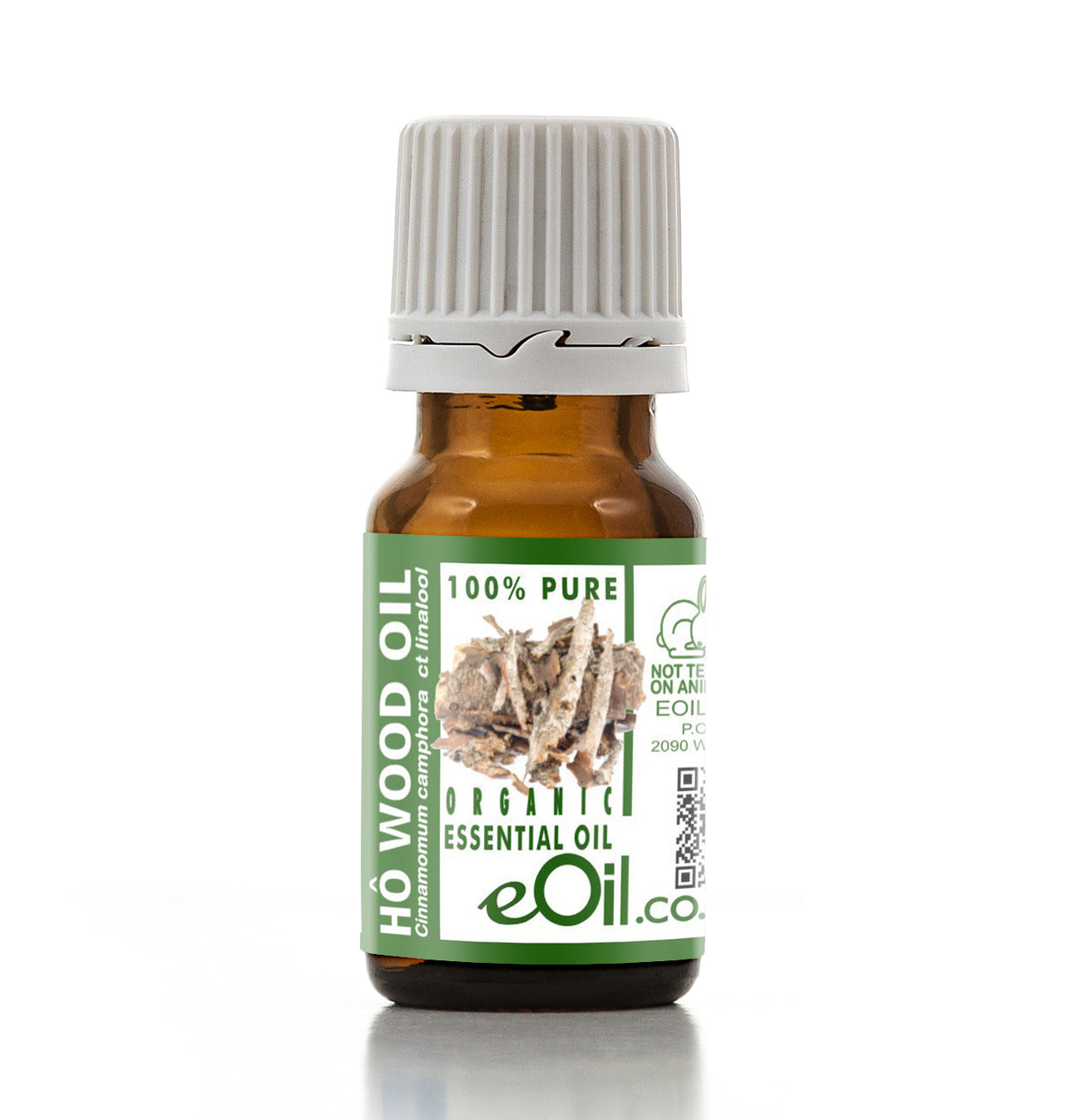 Bottle of Ho Wood oil with a green label on a white background