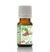 Bottle of Jojoba Oil with a green label on a white background