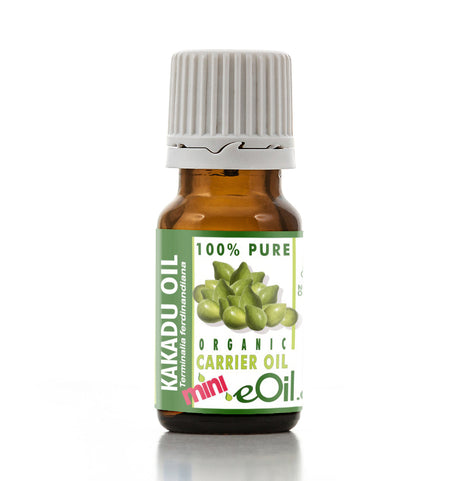 Bottle of Kakadu oil with a green label on a white background