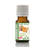 Bottle of Karanja oil with a green label on a white background
