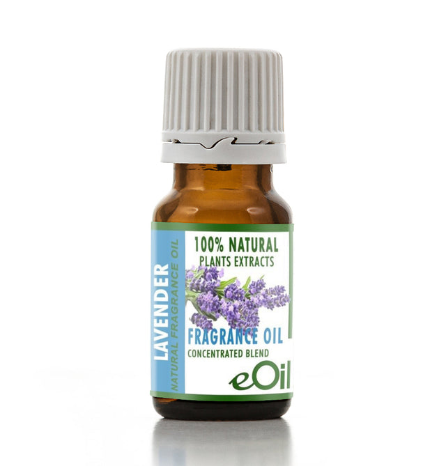 A small amber glass bottle of lavender fragrance oil with a white ribbed cap and a blue, green, and purple label, shown on a white background with a soft reflection.