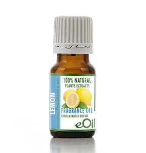 A small amber glass bottle of eOil Lemon Fragrance Oil with a white ribbed cap, featuring a label with lemon illustrations and text indicating natural fragrance oil.