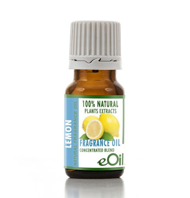 A small amber glass bottle of eOil Lemon Fragrance Oil with a white ribbed cap, featuring a label with lemon illustrations and text indicating natural fragrance oil.