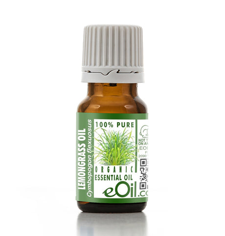 Bottle of lemon grass essential oil with a green label on a white background