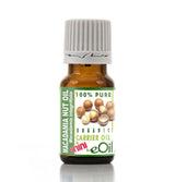 Bottle of Macadamia Nut Oil with a green label on a white background