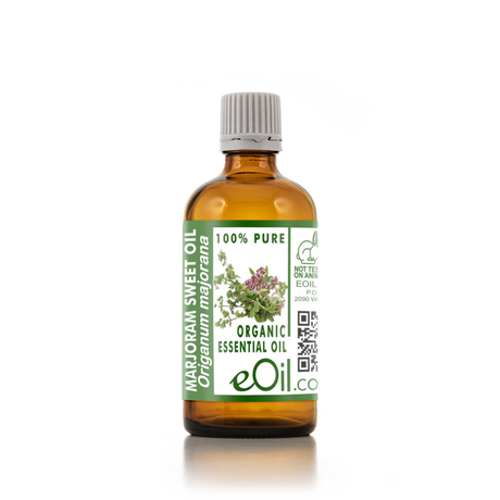Bottle of organic essential oil with a label on a white background 100 ml