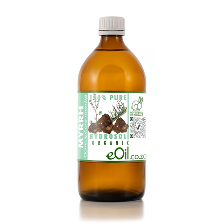 An amber glass bottle of MYRRH hydrosol with a white ribbed cap and a green and white label, set against a plain white background.