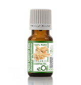 Bottle of Palo Santo oil with a green label on a white background