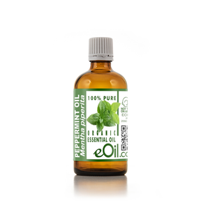 Bottle of peppermint essential oil with a green label on a white background