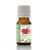Bottle of pomegranate oil with a green label on a white background