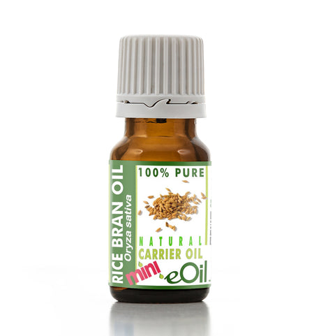 Bottle of rice bran oil with a green label on a white background
