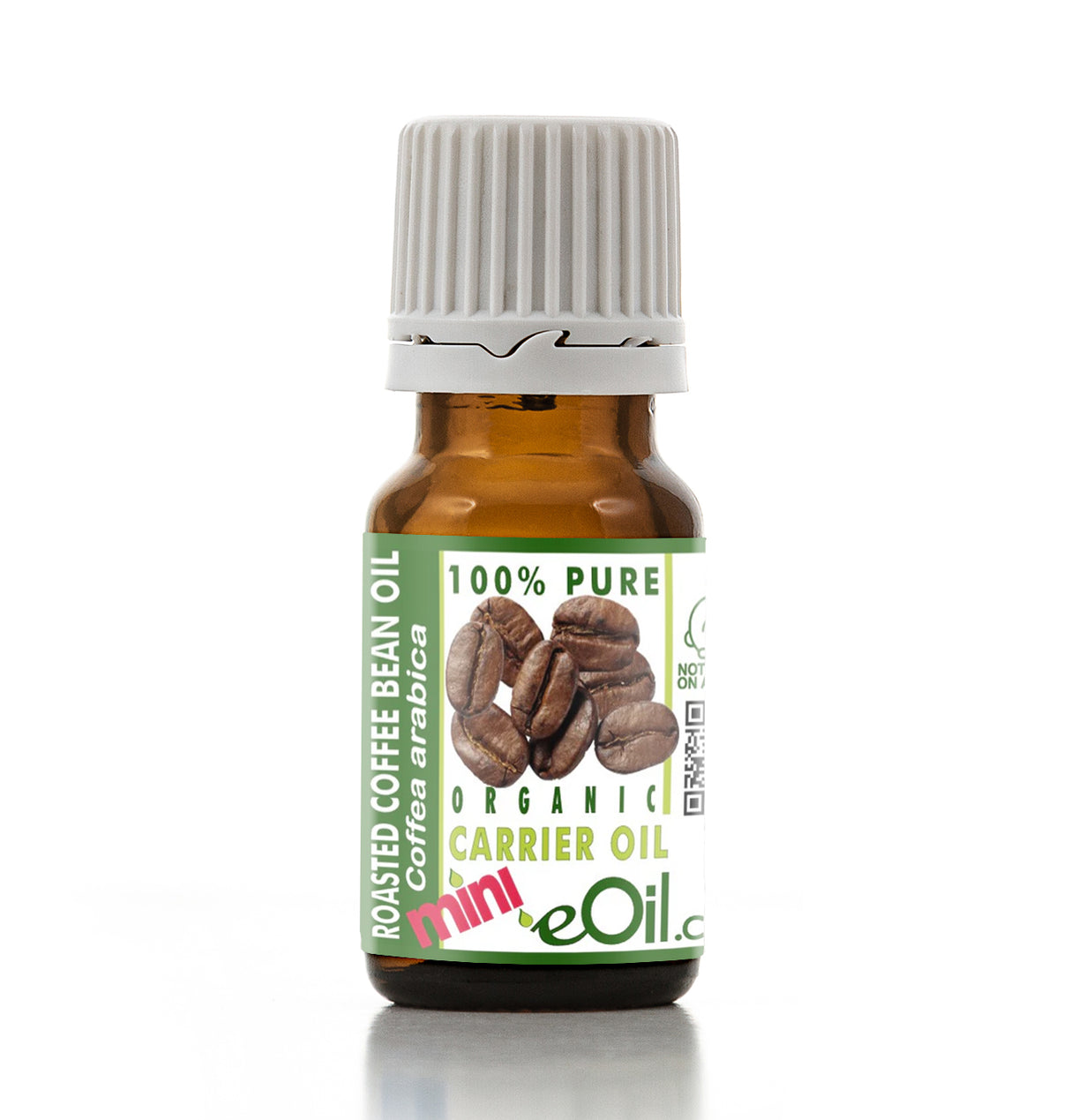 Bottle of roasted coffee bean oil with a label on a white background