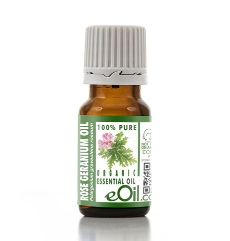 Bottle of Rose Geranium essential oil with a green label on a white background