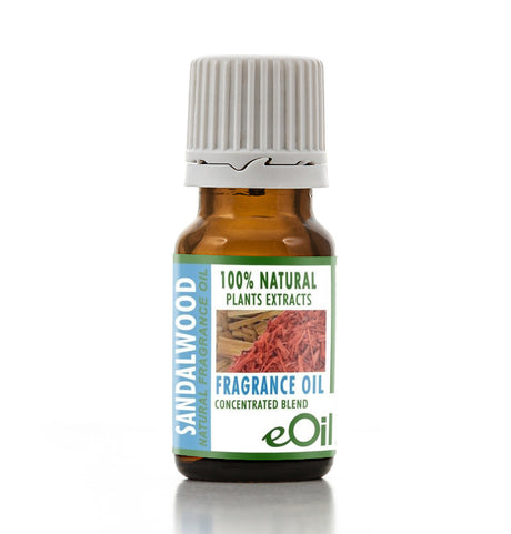 A small amber glass bottle of eOil Sandalwood Natural Fragrance Oil with a white ribbed cap and a green and blue label, set against a plain white background.