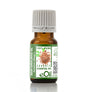 Bottle of Indian Sandalwood essential oil with a green label on a white background