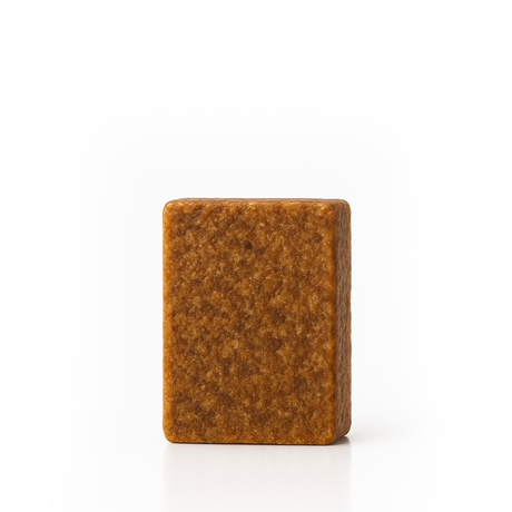 Rectangular brown bar of soap on a white background