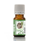 Bottle of Vetiver essential oil with a green label on a white background