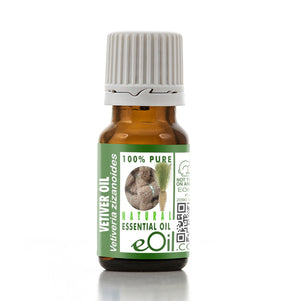 Bottle of Vetiver essential oil with a green label on a white background