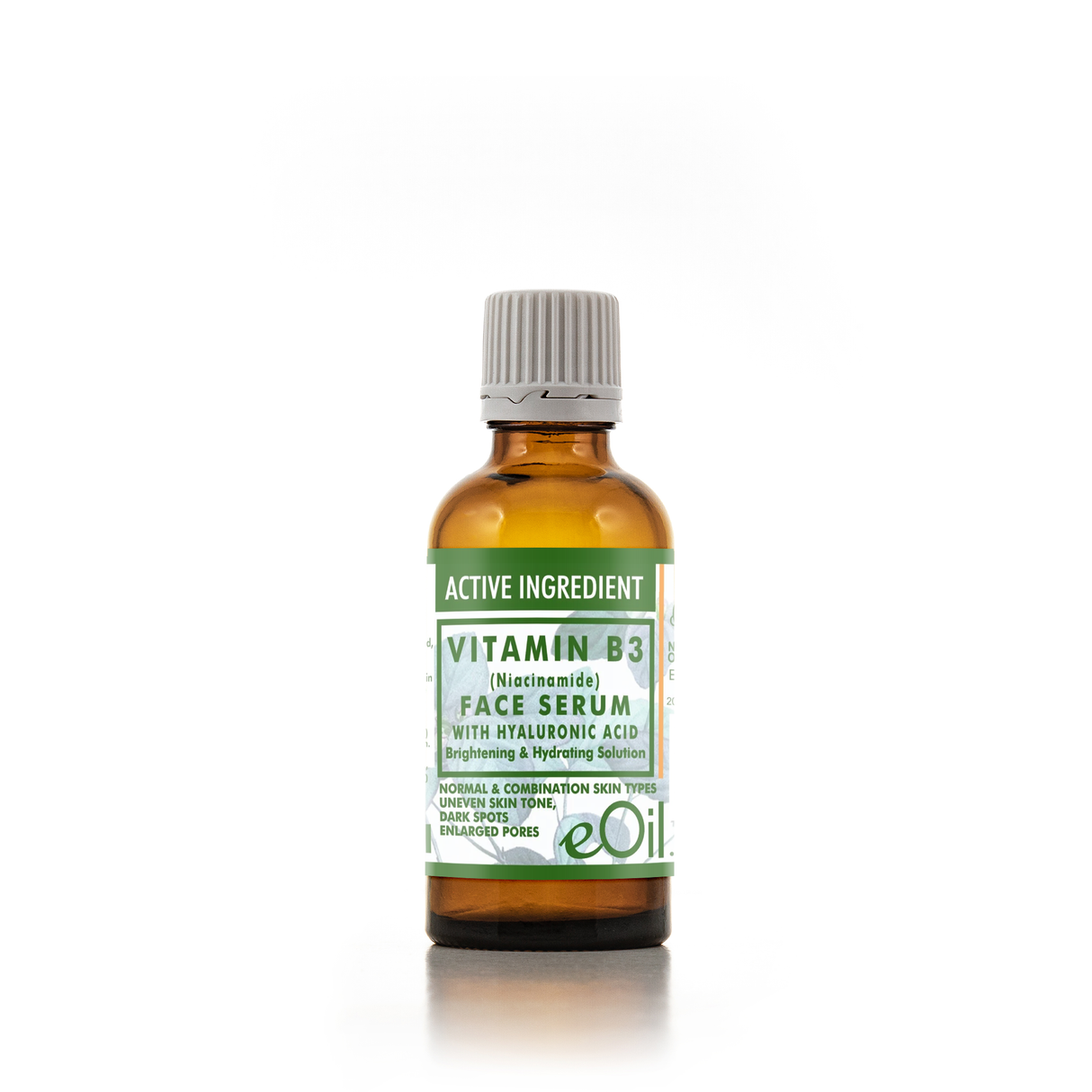 An amber glass bottle of eOil Vitamin B3 Face Serum with a white and green label and a gray ribbed cap, set against a plain white background.
